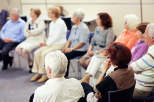 group of older adults in a discussion circle